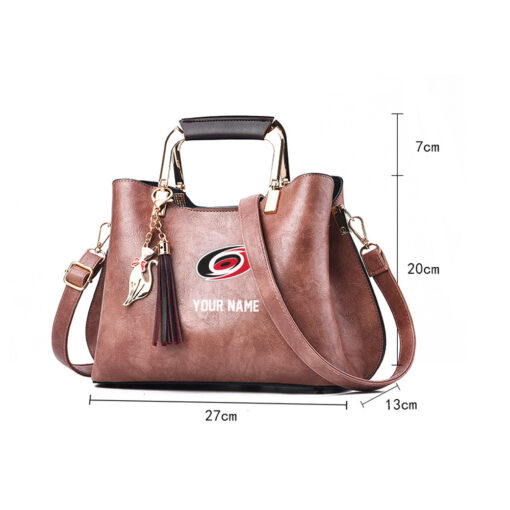 NHL - True fans of Carolina Hurricanes's Hand Bag:nhl,hand bag,leather handbag,nhl hand bag