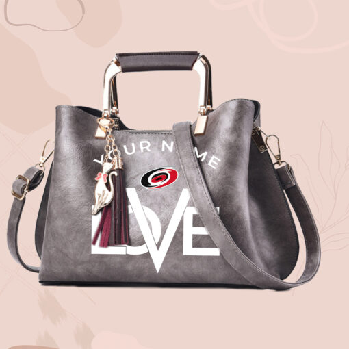 NHL - True fans of Carolina Hurricanes's Hand Bag:nhl,hand bag,leather handbag,nhl hand bag