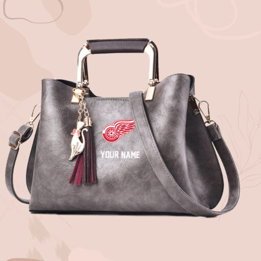 NHL - True fans of Detroit Red Wings's Hand Bag:nhl,hand bag,leather handbag,nhl hand bag