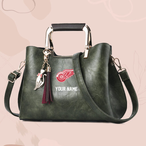 NHL - True fans of Detroit Red Wings's Hand Bag:nhl,hand bag,leather handbag,nhl hand bag