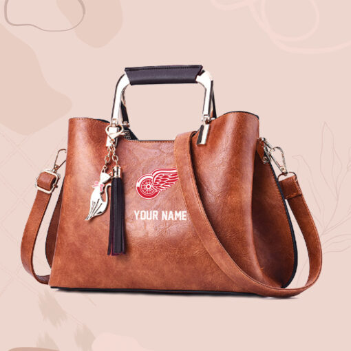 NHL - True fans of Detroit Red Wings's Hand Bag:nhl,hand bag,leather handbag,nhl hand bag