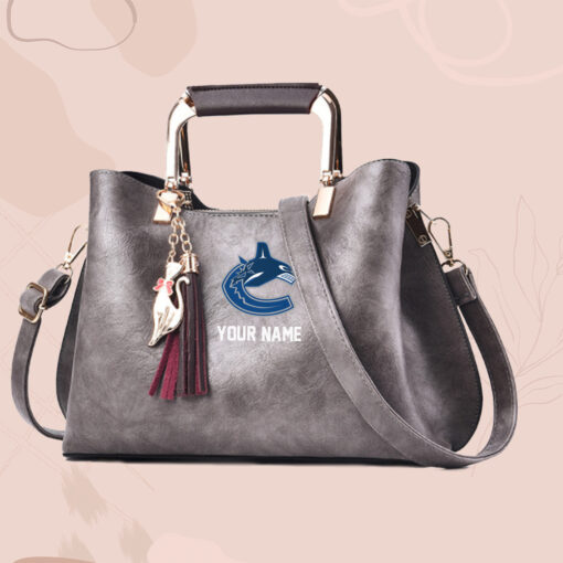 NHL - True fans of Vancouver Canucks's Hand Bag:nhl,hand bag,leather handbag,nhl hand bag