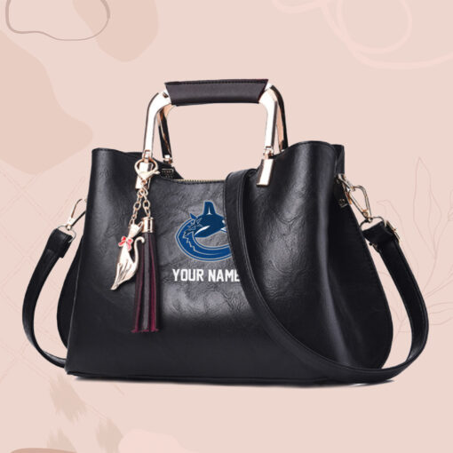 NHL - True fans of Vancouver Canucks's Hand Bag:nhl,hand bag,leather handbag,nhl hand bag